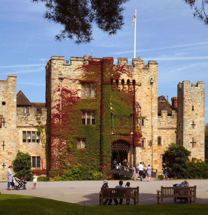 Virginia creeper turning red across the front of Hever Castle's gatehouse